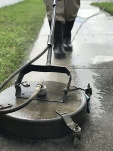 Pressure washing sidewalk