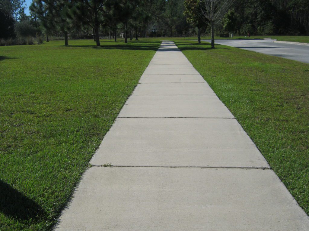 Long clean sidewalk.