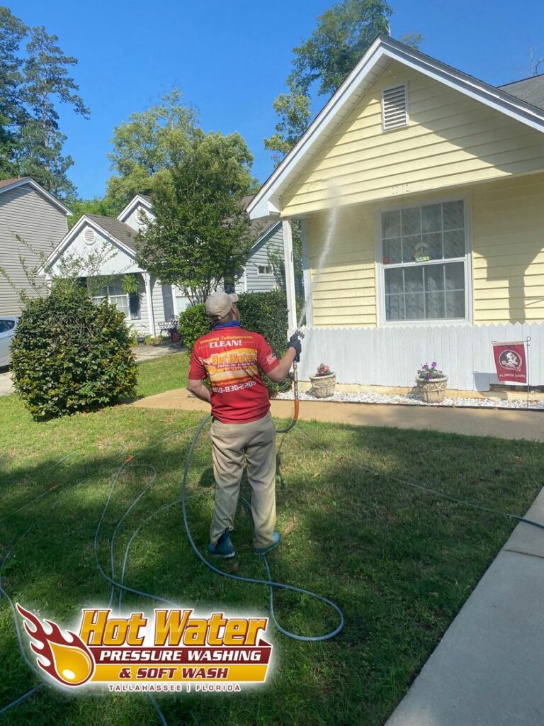 Pressure washing a home in Tallahassee