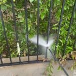 Remove Lichen from a Painted Metal Fence