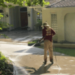 insing a freshly cleaned concrete driveway for a repeat client in Whitfield Plantation, Tallahassee, to prepare the home for the real estate market.