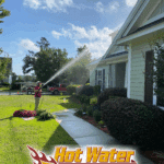 Using safe, low-pressure soft washing methods to gently clean the siding of a beautiful home in Southwood, Tallahassee, and restore its curb appeal.