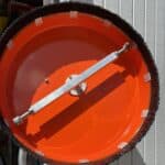 The stock 2-nozzle spray bar that ships with a Whisper Wash surface cleaner before being upgraded to a 4-nozzle bar.