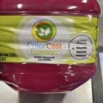 A bottle of magenta colorant, the organic pigment paint stores use that can react with soft wash solutions and cause color change.