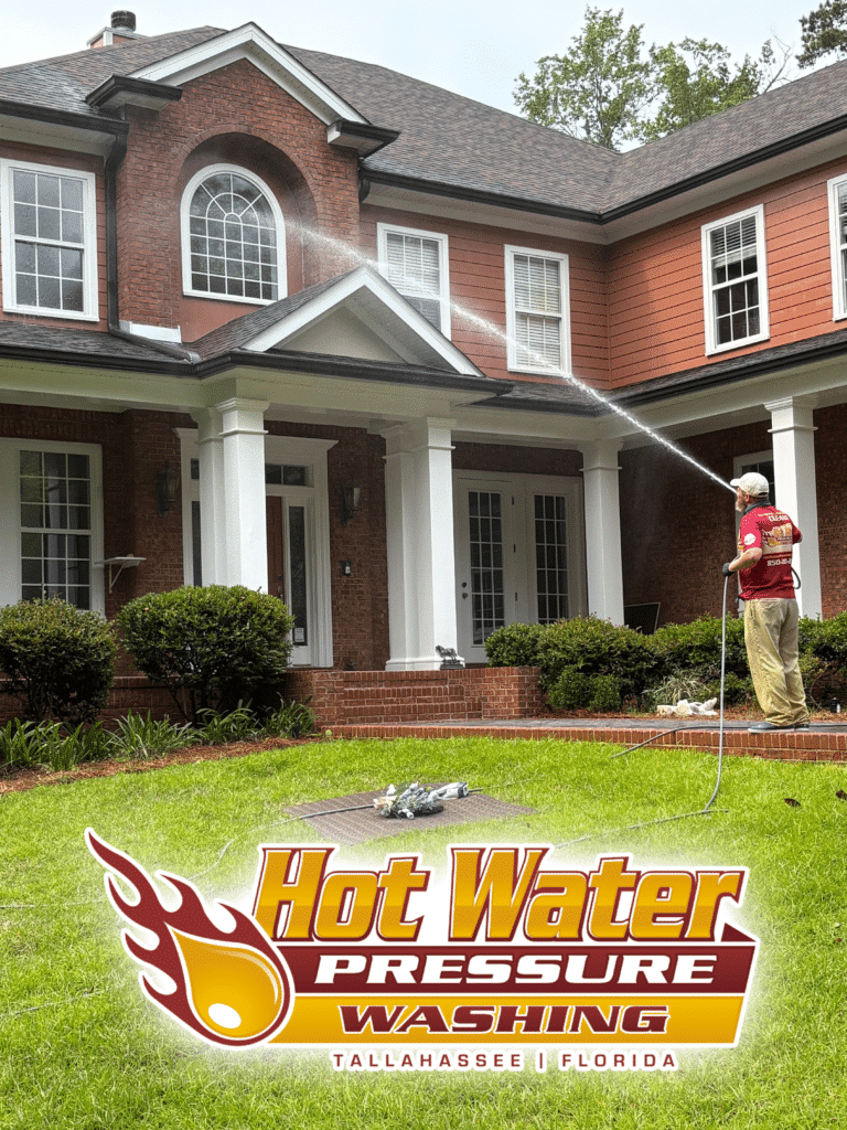 Nick Loomis, owner of Hot Water Pressure Washing, performing a professional Soft Wash House Washing on a very large residential home in North Tallahassee, Florida.