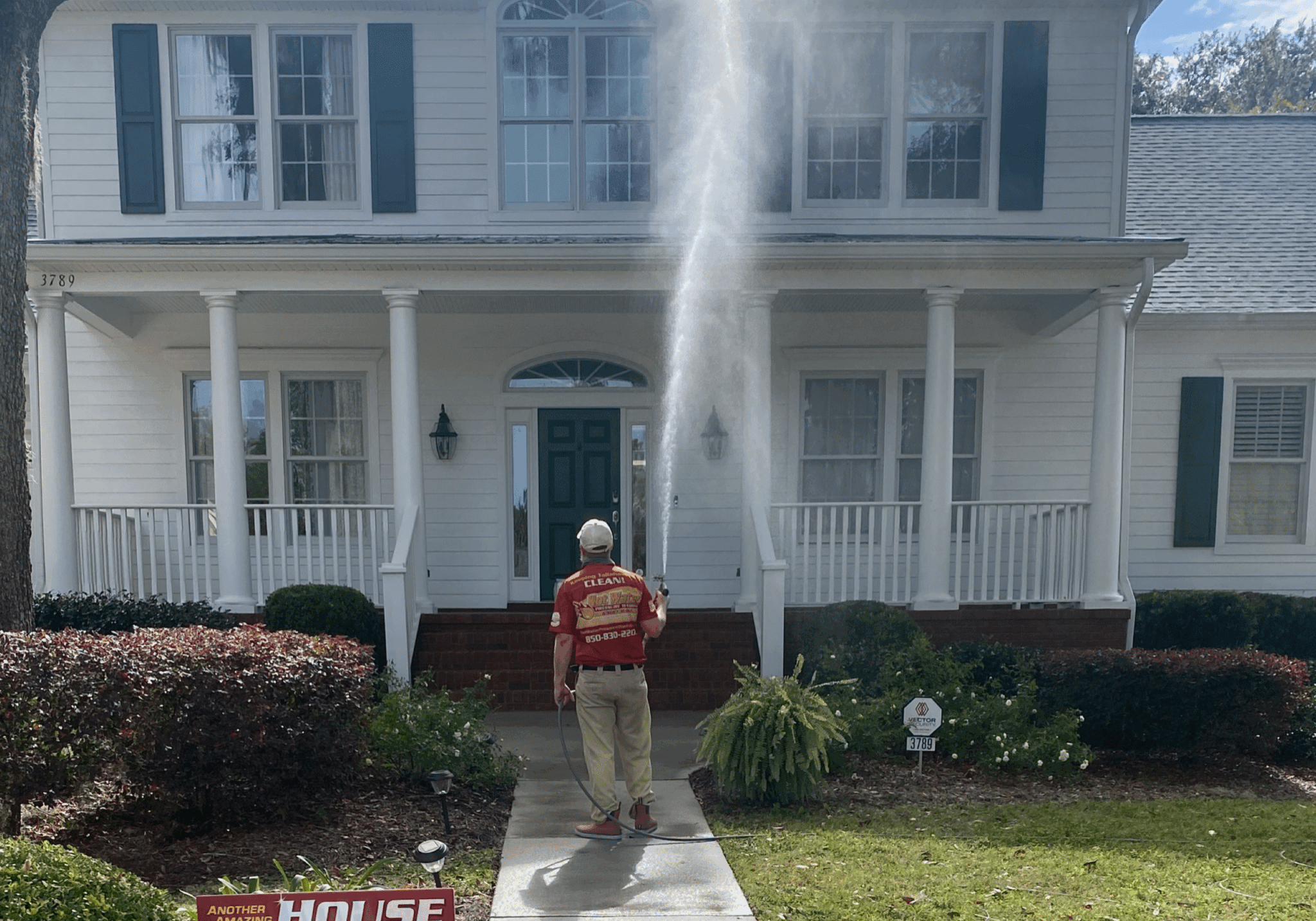A Southwood home receiving a professional soft wash cleaning.