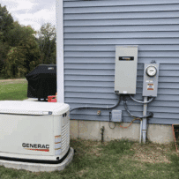 Image of a residential standby generator, demonstrating the importance of using professional soft washing techniques to safely clean a home's exterior.